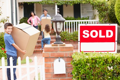 Movers carefully loading household items for a Bexleyheath move